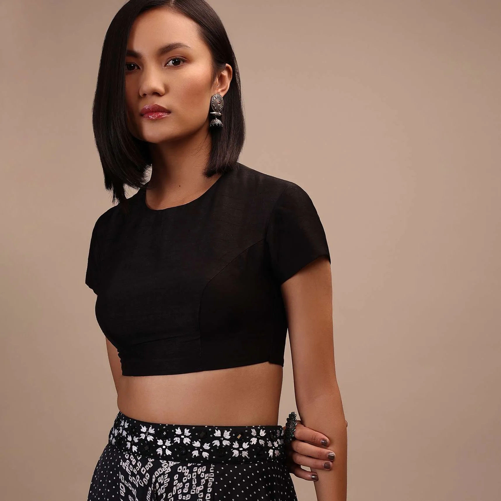 Black Cap Sleeves Blouse In The Round Neck. Raw Silk With Cut Out Back Neck And Hook Closure