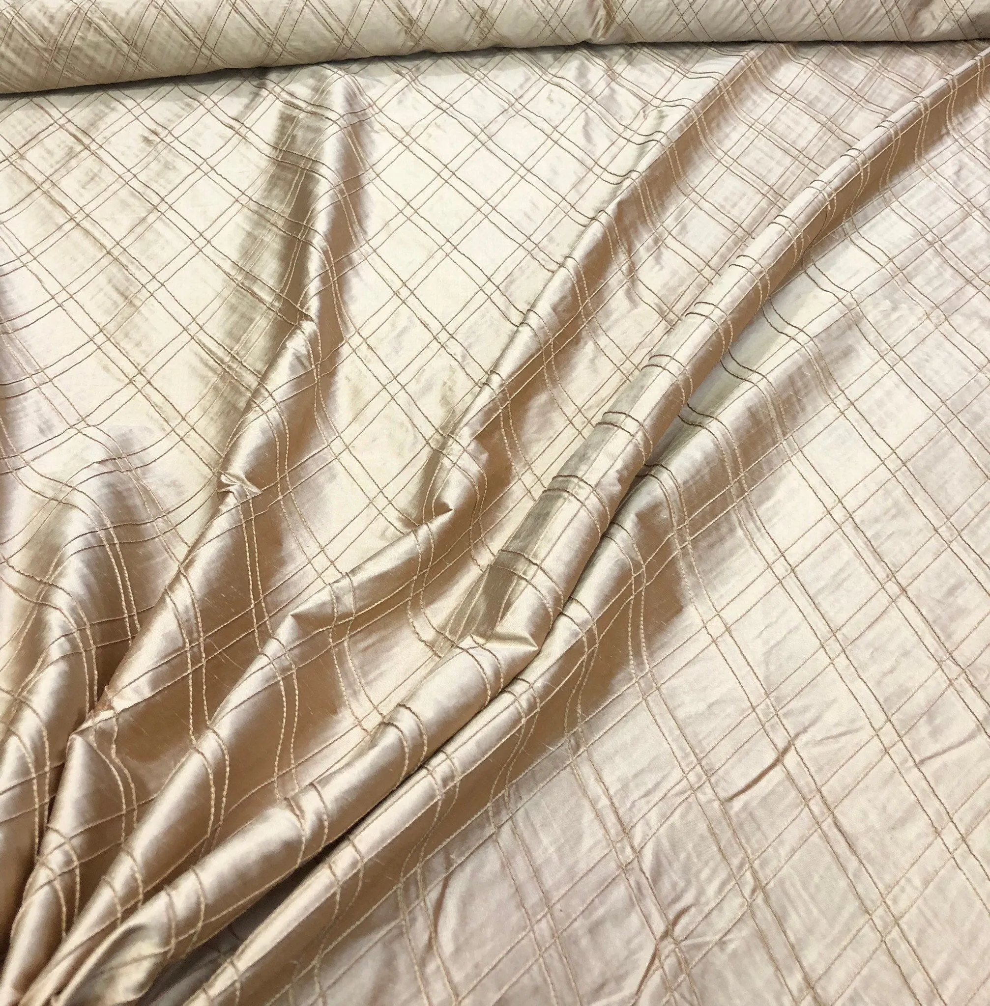 Silk shantung pintuck 52&quot; wide    Beautiful champagne color silk shantung pintuck fabric sold by the yard