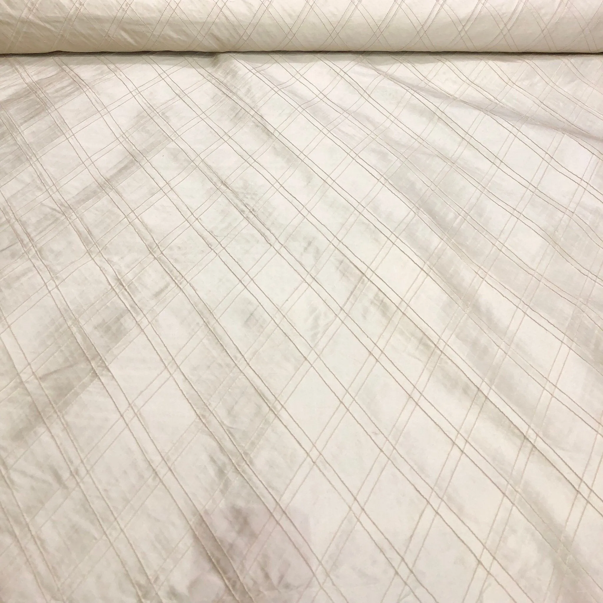 Silk shantung pintuck 52&quot; wide    Beautiful ivory color silk shantung pintuck fabric sold by the yard