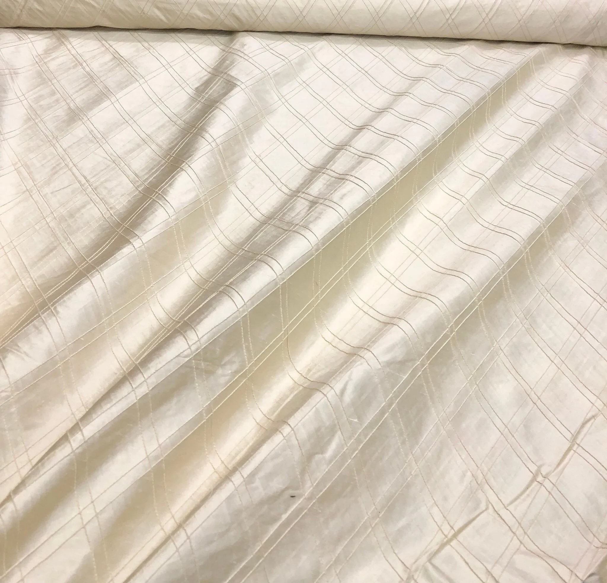 Silk shantung pintuck 52&quot; wide    Beautiful ivory color silk shantung pintuck fabric sold by the yard