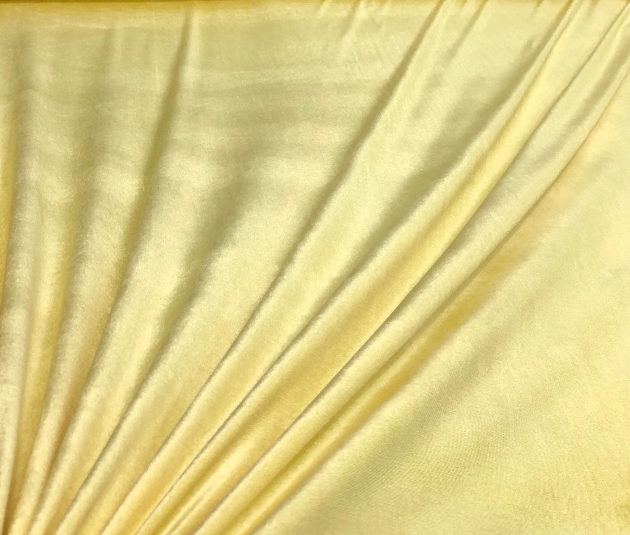 Stretch velvet 60&quot; wide    Beautiful lime yellow   Could also be called canary yellow    Fabric sold by the yard